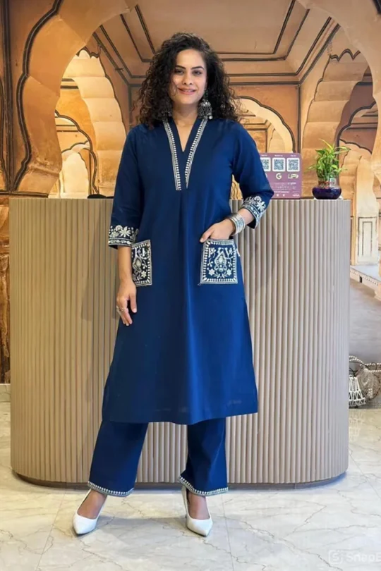 Front view of a 47-inch long Slub Cotton V-neck kurta with embroidered pockets and matching 38-inch trousers in deep Blue