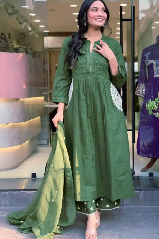 Olive green cotton suit set with Pintex neck design and hand-embroidered pockets.